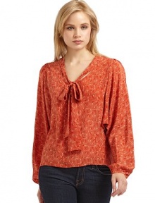 THE LOOKPrinted designPullover styleV-neck with tie detailLong button cuff dolman sleevesTHE FITAbout 25 from shoulder to hemTHE MATERIALSilkCARE & ORIGINDry cleanImportedModel shown is 5'10 (177cm) wearing US size Small. THE LOOKPrinted designPullover styleV-neck with tie detailLong button cuff dolman sleevesTHE FITAbout 25 from shoulder to hemTHE MATERIALSilkCARE & ORIGINDry cleanImportedModel shown is 5'10 (177cm) wearing US size Small.