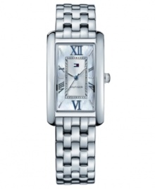 Stunning style for every day, by Tommy Hilfiger. This watch features a stainless steel bracelet and rectangular case. Mother-of-pearl dial with Roman numerals, stick indices and logo, Quartz movement. Water resistant to 30 meters. Ten-year limited warranty. Stunning style for every day, by Tommy Hilfiger. This watch features a stainless steel bracelet and rectangular case. Mother-of-pearl dial with Roman numerals, stick indices and logo, Quartz movement. Water resistant to 30 meters. Ten-year limited warranty.
