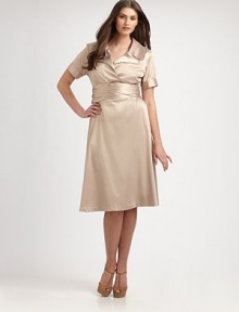 An elegant stretch satin design inspired by the classic trench coat. Collar neckShort sleevesButton-detail cuffsSelf-tie at waistAbout 25 from natural waist55% polyester/42% rayon/3% spandexDry cleanMade in USA of imported fabric An elegant stretch satin design inspired by the classic trench coat. Collar neckShort sleevesButton-detail cuffsSelf-tie at waistAbout 25 from natural waist55% polyester/42% rayon/3% spandexDry cleanMade in USA of imported fabric