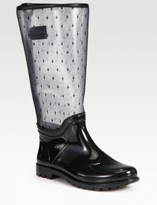 Scattered woven polka dots lend whimsical style to this rainy weather essential with leather trim. Rubber heel, 1 (25mm)Shaft, 13¼Leg circumference, 14½PVC upper with leather trim upper and point d'esprit panelingRubber liningRubber trek solePadded insoleMade in Italy