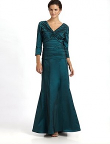 THE LOOKPleated V neckline with center knotSmooth bracelet sleeves with pleated cuffsPleated bodyBack zipper with hook-and-eyeTHE FITAbout 20 from shoulder to hemTHE MATERIAL92% polyester/8% spandexFully linedCARE & ORIGINDry cleanImported THE LOOKPleated V neckline with center knotSmooth bracelet sleeves with pleated cuffsPleated bodyBack zipper with hook-and-eyeTHE FITAbout 20 from shoulder to hemTHE MATERIAL92% polyester/8% spandexFully linedCARE & ORIGINDry cleanImported