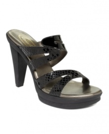 Slide into this sophisticated style. The Elegance sandals by Callisto feature snake print contrast on the upper straps and cutout detail along the vamp. Slide into this sophisticated style. The Elegance sandals by Callisto feature snake print contrast on the upper straps and cutout detail along the vamp.