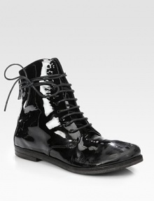 Extra long wrap-around laces add urban-cool style to this easy patent leather silhouette. Stacked heel, ¾ (20mm)Patent leather upperBack zipLeather lining and solePadded insoleMade in ItalyOUR FIT MODEL RECOMMENDS ordering one half size up as this style runs small. Extra long wrap-around laces add urban-cool style to this easy patent leather silhouette. Stacked heel, ¾ (20mm)Patent leather upperBack zipLeather lining and solePadded insoleMade in ItalyOUR FIT MODEL RECOMMENDS ordering one half size up as this style runs small.
