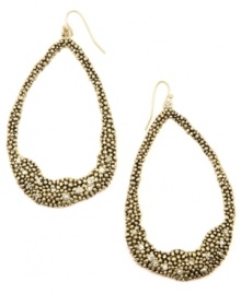 Organic inspiration. A subtle asymmetrical design makes RACHEL Rachel Roy's trendy hoop earrings a total must-have. Crafted in gold-plated mixed metal with sparkling crystal accents. Approximate drop: 3-1/4 inches. Organic inspiration. A subtle asymmetrical design makes RACHEL Rachel Roy's trendy hoop earrings a total must-have. Crafted in gold-plated mixed metal with sparkling crystal accents. Approximate drop: 3-1/4 inches.