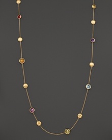 Faceted semi-precious stones mingle with textured 18K yellow gold beads on this long necklace from the Marco Bicego Jaipur collection. Faceted semi-precious stones mingle with textured 18K yellow gold beads on this long necklace from the Marco Bicego Jaipur collection.