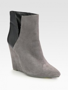 Urban-ready suede and leather design on a sturdy wedge, with a side slit for easy on and off access. Suede-covered wedge, 4¼ (110mm)Suede and nappa leather upperPoint toePull-on style with side slitLeather liningRubber solePadded insoleImported Urban-ready suede and leather design on a sturdy wedge, with a side slit for easy on and off access. Suede-covered wedge, 4¼ (110mm)Suede and nappa leather upperPoint toePull-on style with side slitLeather liningRubber solePadded insoleImported