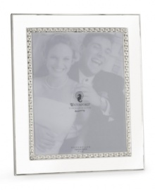 This silver-plated picture frame displays the classic elegance of Waterford. Makes a thoughtful gift. This silver-plated picture frame displays the classic elegance of Waterford. Makes a thoughtful gift.