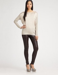 Pure elegance in fine silk and jersey knit styled with a wide, skin-baring ballet neckline.Ballet neckDropped shouldersLong sleevesBack box pleatPullover styleSilkDry cleanImportedModel shown is 5'11 (180cm) wearing US size Small. Pure elegance in fine silk and jersey knit styled with a wide, skin-baring ballet neckline.Ballet neckDropped shouldersLong sleevesBack box pleatPullover styleSilkDry cleanImportedModel shown is 5'11 (180cm) wearing US size Small.