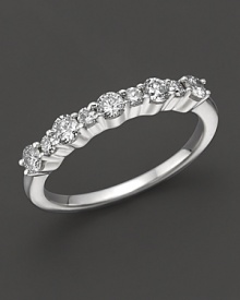 Diamond band in 14K white gold. Diamond band in 14K white gold.