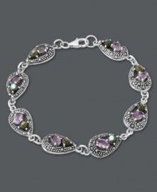Tap into your elegant side. Genevieve & Grace's teardrop link bracelet combines sparkling amethyst (3-1/8 ct. t.w.), marcasite and abalone shells for a look that's pastel perfect. Set in sterling silver. Approximate length: 7-1/2 inches. Tap into your elegant side. Genevieve & Grace's teardrop link bracelet combines sparkling amethyst (3-1/8 ct. t.w.), marcasite and abalone shells for a look that's pastel perfect. Set in sterling silver. Approximate length: 7-1/2 inches.