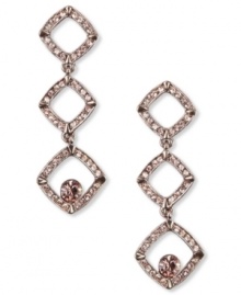 Triple play. These drop earrings from Givenchy sparkle with vintage rose stones and a triple drop silhouette. Crafted in brown gold tone mixed metal. Approximate drop: 2-1/8 inches. Triple play. These drop earrings from Givenchy sparkle with vintage rose stones and a triple drop silhouette. Crafted in brown gold tone mixed metal. Approximate drop: 2-1/8 inches.