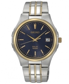 High-powered craftsmanship in a stylish presentation, by Seiko. Crafted of two-tone stainless steel bracelet and round case with gold-tone bezel. Dark blue dial with gold-tone hands, applied stick indices at markers, date window at three o'clock and logo at twelve o'clock. Solar-powered quartz movement. Water resistant to 100 meters. Three-year limited warranty. High-powered craftsmanship in a stylish presentation, by Seiko. Crafted of two-tone stainless steel bracelet and round case with gold-tone bezel. Dark blue dial with gold-tone hands, applied stick indices at markers, date window at three o'clock and logo at twelve o'clock. Solar-powered quartz movement. Water resistant to 100 meters. Three-year limited warranty.