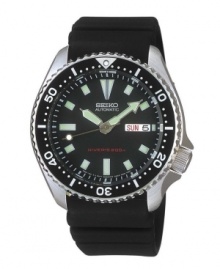 The ultimate diving companion. No detail was overlooked on this Seiko watch crafted of extra-long, pressure-vented black polyurethane strap and round stainless steel case with black one-way rotating elapsed timing bezel, 40mm. Black dial features LumiBrite stick indices, minute track, day and date window at three o'clock, three LumiBrite hands and logo. Automatic movement. Water resistant to 200 meters. Three-year limited warranty. The ultimate diving companion. No detail was overlooked on this Seiko watch crafted of extra-long, pressure-vented black polyurethane strap and round stainless steel case with black one-way rotating elapsed timing bezel, 40mm. Black dial features LumiBrite stick indices, minute track, day and date window at three o'clock, three LumiBrite hands and logo. Automatic movement. Water resistant to 200 meters. Three-year limited warranty.