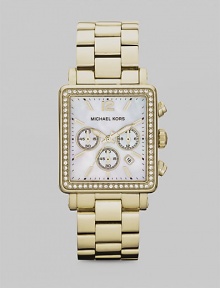 Show your true sparkle in this radiant, technical timepiece with a crystal bezel. Quartz movementWater resistant to 5 ATMRectangular goldtone stainless steel case, 35mm (1.3) X 32mm (1.2)Crystal bezelMother-of-pearl chronograph dialNumeric and bar hour markersDate display between 4 and 5 o'clockSecond hand Goldtone stainless steel link braceletImported Show your true sparkle in this radiant, technical timepiece with a crystal bezel. Quartz movementWater resistant to 5 ATMRectangular goldtone stainless steel case, 35mm (1.3) X 32mm (1.2)Crystal bezelMother-of-pearl chronograph dialNumeric and bar hour markersDate display between 4 and 5 o'clockSecond hand Goldtone stainless steel link braceletImported