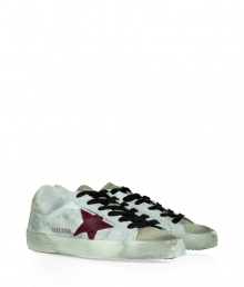 Modeled after vintage tennis shoes, this high-end version from Golden Goose will add an instant upgrade to your casual-cool style - Round suede toe, lace-up front, two-tone upper with side star detail, embossed leather logo detail at ankle, stylishly distressed rubber sole - Style with skinny jeans, a mini-skirt, or cut off denim shorts Modeled after vintage tennis shoes, this high-end version from Golden Goose will add an instant upgrade to your casual-cool style - Round suede toe, lace-up front, two-tone upper with side star detail, embossed leather logo detail at ankle, stylishly distressed rubber sole - Style with skinny jeans, a mini-skirt, or cut off denim shorts
