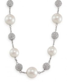 Carolee creates an icy illusion with this stunning necklace. Glass pearls and crystal-accented fireballs alternate on a chain crafted of imitation rhodium-plated mixed metal. Approximate length: 16 inches + 2-inch extender. Carolee creates an icy illusion with this stunning necklace. Glass pearls and crystal-accented fireballs alternate on a chain crafted of imitation rhodium-plated mixed metal. Approximate length: 16 inches + 2-inch extender.
