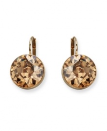 Be a golden girl in these stunners from Swarovski. Earrings feature bold yellow crystals on gold-plated mixed metal. Approximate drop: 1 inch. Be a golden girl in these stunners from Swarovski. Earrings feature bold yellow crystals on gold-plated mixed metal. Approximate drop: 1 inch.