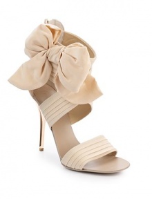 THE LOOKCross-over ankle strapsSide bow detailBack zipTHE FITManmade heel, 4 (100mm)THE MATERIALSatin-and-suede upperManmade soleORIGINMade in Italy THE LOOKCross-over ankle strapsSide bow detailBack zipTHE FITManmade heel, 4 (100mm)THE MATERIALSatin-and-suede upperManmade soleORIGINMade in Italy