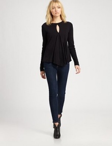 Unbelievably soft, fuss-free basic renewed by a front keyhole detail and a modified peplum hem. RoundneckKeyhole detailLong sleevesModified peplum hemCottonMachine washMade in USAModel shown is 5'10 (177cm) wearing US size Small. Unbelievably soft, fuss-free basic renewed by a front keyhole detail and a modified peplum hem. RoundneckKeyhole detailLong sleevesModified peplum hemCottonMachine washMade in USAModel shown is 5'10 (177cm) wearing US size Small.