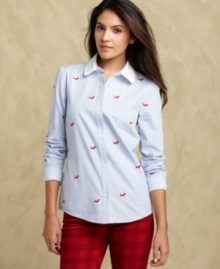 Infuse your look with preppy panache in Tommy Hilfiger's embroidered button-front shirt. Infuse your look with preppy panache in Tommy Hilfiger's embroidered button-front shirt.