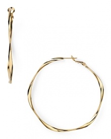 Delicately twisted, this pair of hoop earrings from Aqua is a sophisticated take on a classic style. Make them part of your 24/7 collection to add a simple touch to every look.