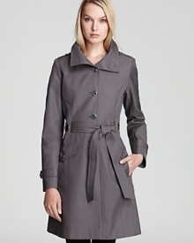 Forgoing belt loops for a woven design, this unique Via Spiga trench coat is a modern choice for the season. Featuring marbled buttons with silver hardware, military-inspired epaulets and a stand collar, it moves from day to evening in of-the-moment style. Forgoing belt loops for a woven design, this unique Via Spiga trench coat is a modern choice for the season. Featuring marbled buttons with silver hardware, military-inspired epaulets and a stand collar, it moves from day to evening in of-the-moment style.