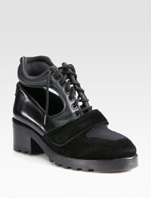 Sexy cutouts transform this urban-ready design, combining distressed and shiny leather with suede trim. Stacked heel, 2¼ (60mm)Stacked platform, ¾ (20mm)Compares to a 1½ heel (40mm)leather and suede upper with velcro strapLeather liningRubber trek solePadded insoleMade in Italy Sexy cutouts transform this urban-ready design, combining distressed and shiny leather with suede trim. Stacked heel, 2¼ (60mm)Stacked platform, ¾ (20mm)Compares to a 1½ heel (40mm)leather and suede upper with velcro strapLeather liningRubber trek solePadded insoleMade in Italy