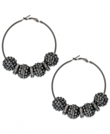 Smoky sophistication, by Style&co. These dusky hoop earrings feature glass crystal beads with spacers. Crafted in hematite tone mixed metal. Approximate diameter: 2-3/8 inches. Smoky sophistication, by Style&co. These dusky hoop earrings feature glass crystal beads with spacers. Crafted in hematite tone mixed metal. Approximate diameter: 2-3/8 inches.