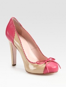 Timeless patent leather sweetened by frilly colorblock leather trim and a dainty bow adornment. Self-covered heel, 4 (100mm)Patent leather and leather upperLeather lining and solePadded insoleMade in ItalyOUR FIT MODEL RECOMMENDS ordering one half size up as this style runs small. Timeless patent leather sweetened by frilly colorblock leather trim and a dainty bow adornment. Self-covered heel, 4 (100mm)Patent leather and leather upperLeather lining and solePadded insoleMade in ItalyOUR FIT MODEL RECOMMENDS ordering one half size up as this style runs small.