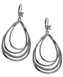 Chic curves. A perfect pear silhouette defines these distinctive drop earrings from T Tahari's Essentials Collection. Accented by sparkling clear crystals, they'll add glitter and glamour to your style for daytime or evening. Made in silver tone mixed metal and nickel-free for sensitive skin. Approximate drop: 2-1/2 inches. Chic curves. A perfect pear silhouette defines these distinctive drop earrings from T Tahari's Essentials Collection. Accented by sparkling clear crystals, they'll add glitter and glamour to your style for daytime or evening. Made in silver tone mixed metal and nickel-free for sensitive skin. Approximate drop: 2-1/2 inches.