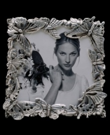 Make fond memories feel as fresh as spring with this square picture frame from Arthur Court. Silver-plated butterflies gather around your favorite photos, turning each into a fanciful nature scene. Make fond memories feel as fresh as spring with this square picture frame from Arthur Court. Silver-plated butterflies gather around your favorite photos, turning each into a fanciful nature scene.