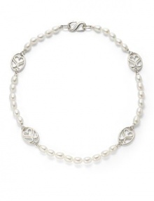 THE LOOKSignature collection7mm white oval pearlsSwirl linksSingle strand silhouetteS hook with latch closure THE MEASUREMENTLength, about 18ORIGINMade in USA THE LOOKSignature collection7mm white oval pearlsSwirl linksSingle strand silhouetteS hook with latch closure THE MEASUREMENTLength, about 18ORIGINMade in USA