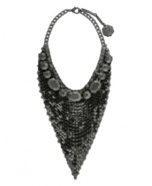 Dramatic and dazzling. Get noticed on your next night out with Vince Camuto's bold bib necklace. Crafted in hematite tone mixed metal, it's embellished with a glittering array of plastic beads woven into an intricate mesh design. Approximate length: 16 inches. Approximate drop: 6-1/2 inches. Dramatic and dazzling. Get noticed on your next night out with Vince Camuto's bold bib necklace. Crafted in hematite tone mixed metal, it's embellished with a glittering array of plastic beads woven into an intricate mesh design. Approximate length: 16 inches. Approximate drop: 6-1/2 inches.