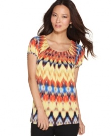 Try a touch of tribal print -- with a truly affordable price -- with Style&co.'s pleated top! The collar and sleeves create just the right amount of volume. Try a touch of tribal print -- with a truly affordable price -- with Style&co.'s pleated top! The collar and sleeves create just the right amount of volume.