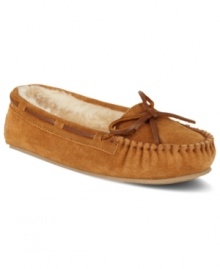 Slip on comfort. Minnetonka's Kayla faux-fur slippers look great and feel even better.
