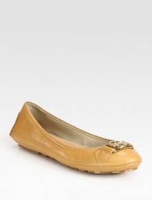 Intricately stitched leather flat with buckle hardware and a rubber sole that's ideal for rainy days. Leather upperLeather liningRubber solePadded insoleImported
