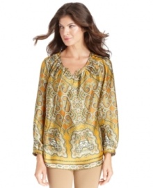 A scarf-inspired status print enlivens the simple silhouette of Jones New York Signature's peasant top. A scarf-inspired status print enlivens the simple silhouette of Jones New York Signature's peasant top.