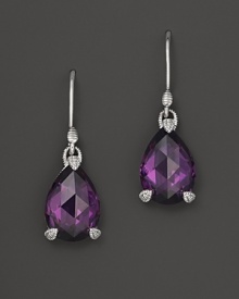 Pear-shaped purple crystal is set in sterling silver on these classic Judith Ripka earrings. Pear-shaped purple crystal is set in sterling silver on these classic Judith Ripka earrings.