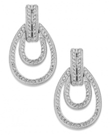 A welcome addition. This pair of door knocker-styled earrings from Eliot Danori is crafted from rhodium-plated brass with crystal accents adding luster. Approximate drop: 1 inch. A welcome addition. This pair of door knocker-styled earrings from Eliot Danori is crafted from rhodium-plated brass with crystal accents adding luster. Approximate drop: 1 inch.