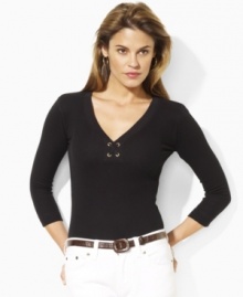Crafted in tried-and-true waffle-knit cotton for lightweight comfort, this cozy three-quarter-sleeved essential from Lauren Jeans Co. exudes chic style with gold-tone hardware and lace-up detailing at the front. Crafted in tried-and-true waffle-knit cotton for lightweight comfort, this cozy three-quarter-sleeved essential from Lauren Jeans Co. exudes chic style with gold-tone hardware and lace-up detailing at the front.