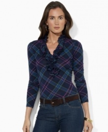 Rendered in a lightweight cotton knit, Lauren Jeans Co.'s soft top features a tiered ruffle trim along the neckline for feminine charm. Rendered in a lightweight cotton knit, Lauren Jeans Co.'s soft top features a tiered ruffle trim along the neckline for feminine charm.