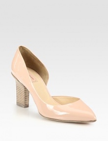 Low-cut silhouette of patent leather, with a stacked block heel and a timeless pointed toe. Stacked monolith heel, 2¾ (70mm)Patent leather upperPoint toeLeather lining and solePadded insoleMade in ItalyOUR FIT MODEL RECOMMENDS ordering one half size up as this style runs small. Low-cut silhouette of patent leather, with a stacked block heel and a timeless pointed toe. Stacked monolith heel, 2¾ (70mm)Patent leather upperPoint toeLeather lining and solePadded insoleMade in ItalyOUR FIT MODEL RECOMMENDS ordering one half size up as this style runs small.