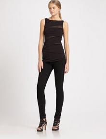 Sheer mesh panels offer a subtle skin-baring chic to this wrapped bandage style.BoatneckSleevelessPullover styleAbout 27 from shoulder to hem94% rayon/6% spandexDry cleanMade in USA of imported fabricModel shown is 5'11 (180cm) wearing US size Small. Sheer mesh panels offer a subtle skin-baring chic to this wrapped bandage style.BoatneckSleevelessPullover styleAbout 27 from shoulder to hem94% rayon/6% spandexDry cleanMade in USA of imported fabricModel shown is 5'11 (180cm) wearing US size Small.