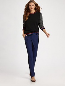 Comfortable wool knit with colorblocked sleeves, banded with colorful stripes at the neck, cuffs and hem.Ribbed crewneckRib-knit cuffs and hemV stitching at necklineWoolDry cleanImported Comfortable wool knit with colorblocked sleeves, banded with colorful stripes at the neck, cuffs and hem.Ribbed crewneckRib-knit cuffs and hemV stitching at necklineWoolDry cleanImported