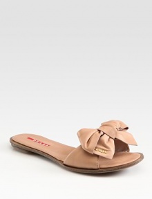 Nappa leather flat with bow detail and leather sole. Leather upperLeather lining and solePadded insoleImportedOUR FIT MODEL RECOMMENDS ordering one half size up as this style runs small. Nappa leather flat with bow detail and leather sole. Leather upperLeather lining and solePadded insoleImportedOUR FIT MODEL RECOMMENDS ordering one half size up as this style runs small.