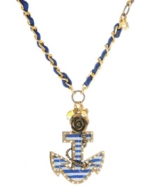 Unearth this buried treasure! Betsey Johnson's chic nautical-themed pendant features a blue pinstripe anchor accented by sparkling crystals and flowers. Setting and chain crafted in gold tone mixed metal and intertwined with a blue ribbon. Approximate length: 16 inches + 3-inch extender. Approximate drop: 2-3/8 inches. Unearth this buried treasure! Betsey Johnson's chic nautical-themed pendant features a blue pinstripe anchor accented by sparkling crystals and flowers. Setting and chain crafted in gold tone mixed metal and intertwined with a blue ribbon. Approximate length: 16 inches + 3-inch extender. Approximate drop: 2-3/8 inches.