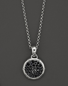 Sterling silver, jointed like a bamboo stalk, circles glittering pavé black sapphire gems on a pendant suspended from a delicate adjustable chain.