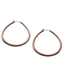 Sweet style from Fossil. Traditional hoop earrings in a teardrop design. Crafted in chocolate tone polished steel. Approximate diameter: 2-1/3 inches. Sweet style from Fossil. Traditional hoop earrings in a teardrop design. Crafted in chocolate tone polished steel. Approximate diameter: 2-1/3 inches.