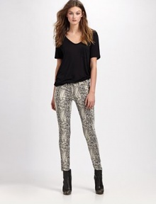 Edgy snake-print denim hugs the body in all the right places.THE FITSlim fitRise, about 8Inseam, about 30THE DETAILSZip flyFive-pocket style98% cotton/2% LycraMachine washMade in USA of imported fabricModel shown is 5'9 (175cm) wearing US size 4. Edgy snake-print denim hugs the body in all the right places.THE FITSlim fitRise, about 8Inseam, about 30THE DETAILSZip flyFive-pocket style98% cotton/2% LycraMachine washMade in USA of imported fabricModel shown is 5'9 (175cm) wearing US size 4.