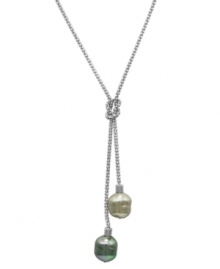 From the island of Mallorca, Spain, this love knot lariat pendant features gray and nuage organic man-made baroque pearls (14 mm) on a sterling silver chain. Approximate length: 16-18 inches. Approximate drop: 4 inches.